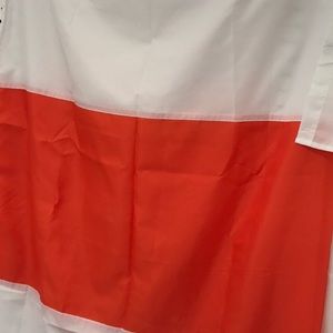 Shower curtain with bold orange and white wide stripes